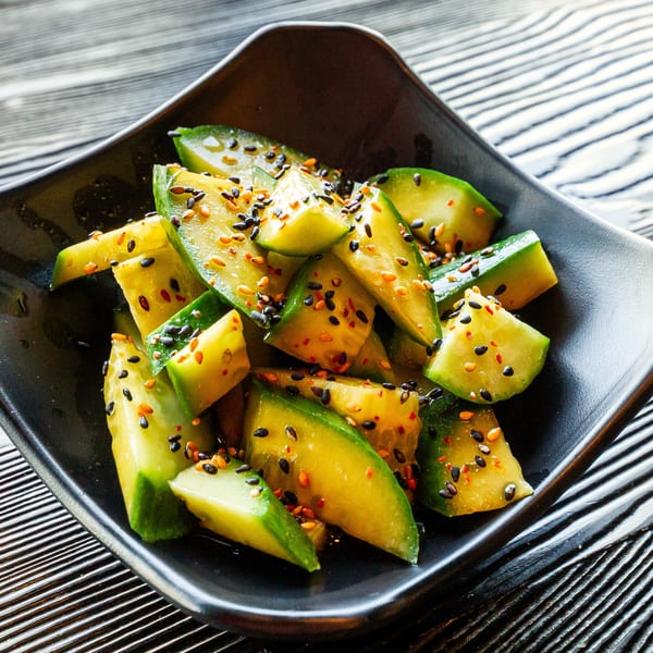 Susukino Ramen Bar's cucumber salad, topped with black and white sesame seeds and red pepper flakes.