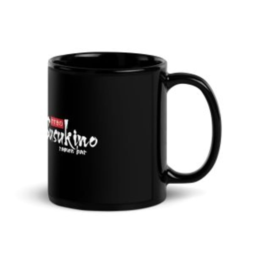 Black Susukino Ramen Bar mug with white logo on a white background.